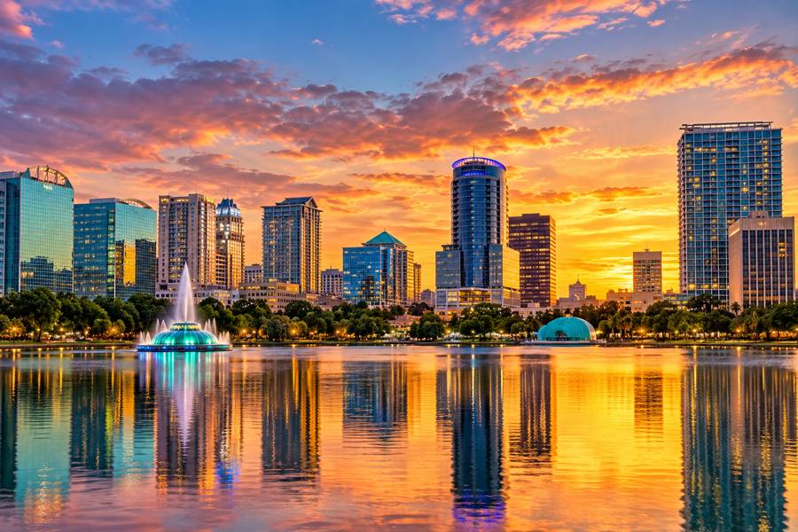 Orlando skyline reflected in Lake Eola at sunset