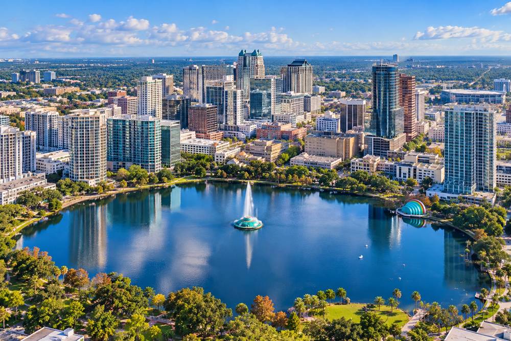 Aerial view of downtown Orlando and Lake Eola with its fountain