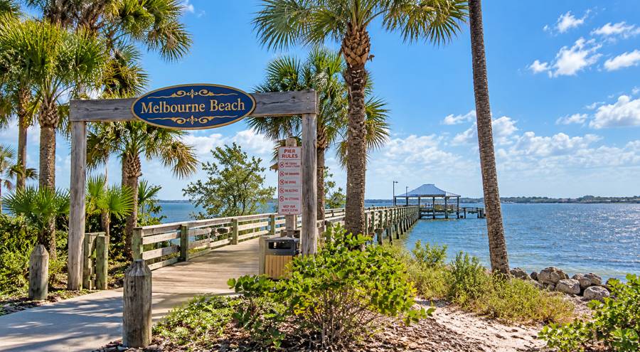 Wooden pier entrance and boardwalk at Melbourne Beach on the Indian River